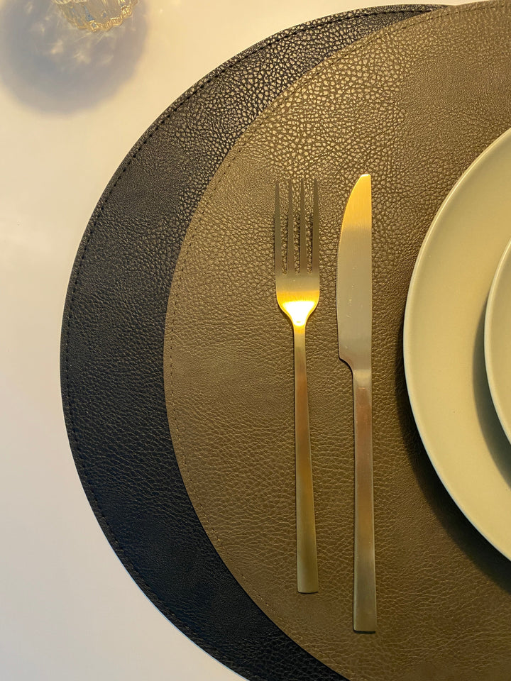 Vändbar bordsunderlägg - PU Ø38 cm svart/oliv