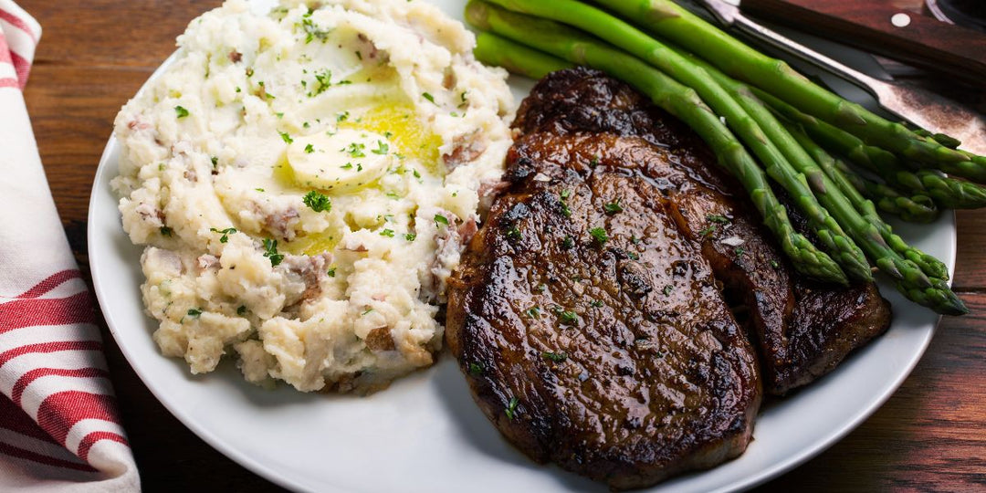 Rostad Ribeye med potatismos, vitlökssmör och sparris