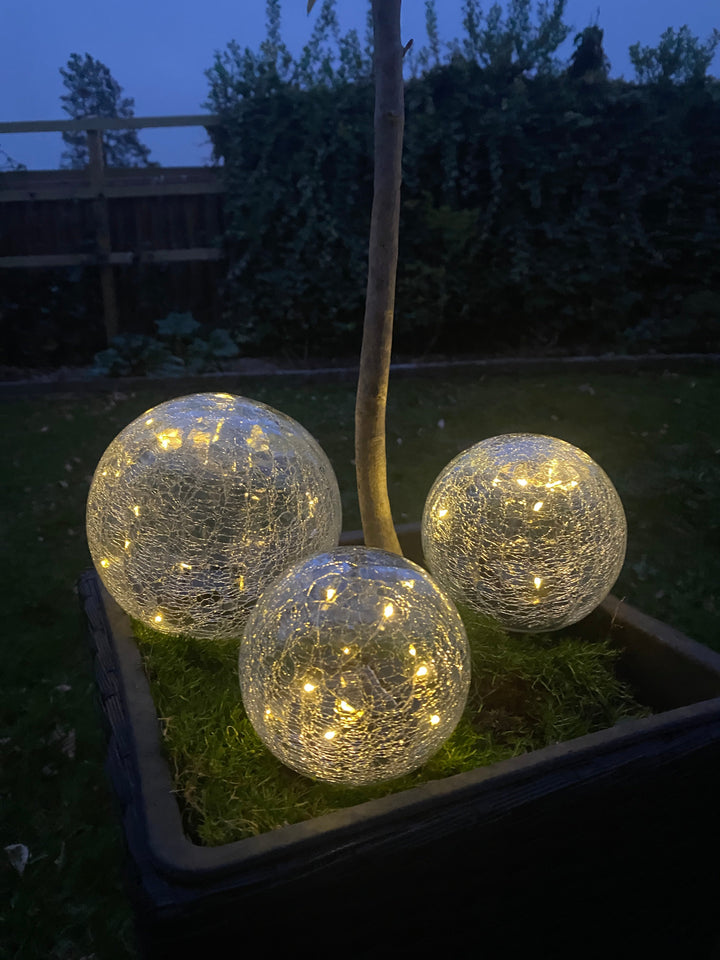 Solglaskulor i sprucket glas - 3 stycken