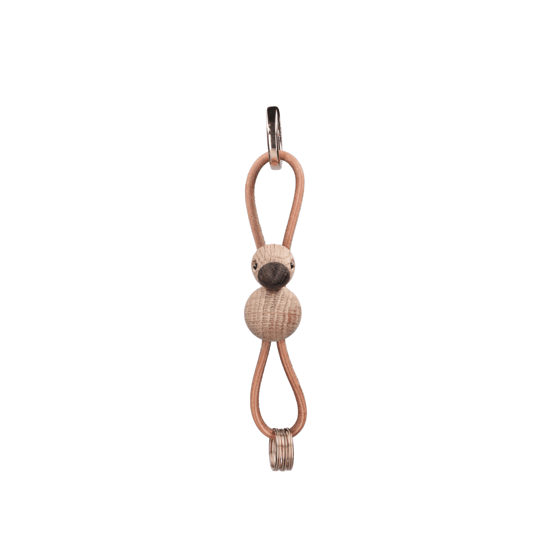 Kay Bojesen - Nyckelring i guldfärgad metall med fågelmotiv och naturligt läder i ek