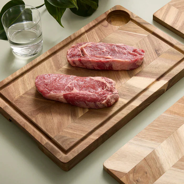 Aida - Skärbräda med saftspår 40x26x3 cm fiskbensmönster akaciaträ